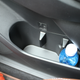 Surprise! That third hole technically isn’t a cupholder, but can sometimes work with smaller bottles and cans.